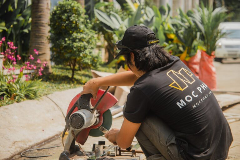 man using circular saw